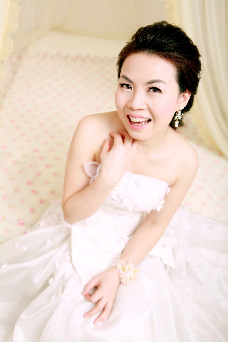 My lovely fiancee in bed at our wedding photo shoot.