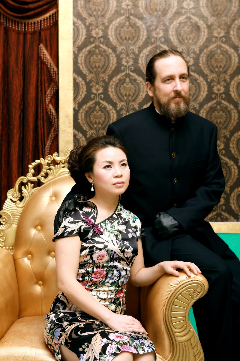 My lovely fiancee steals my chair during scene 7 at our wedding photo shoot.