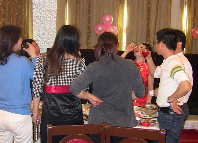 My lovely wife drinking way too much at our wedding party.