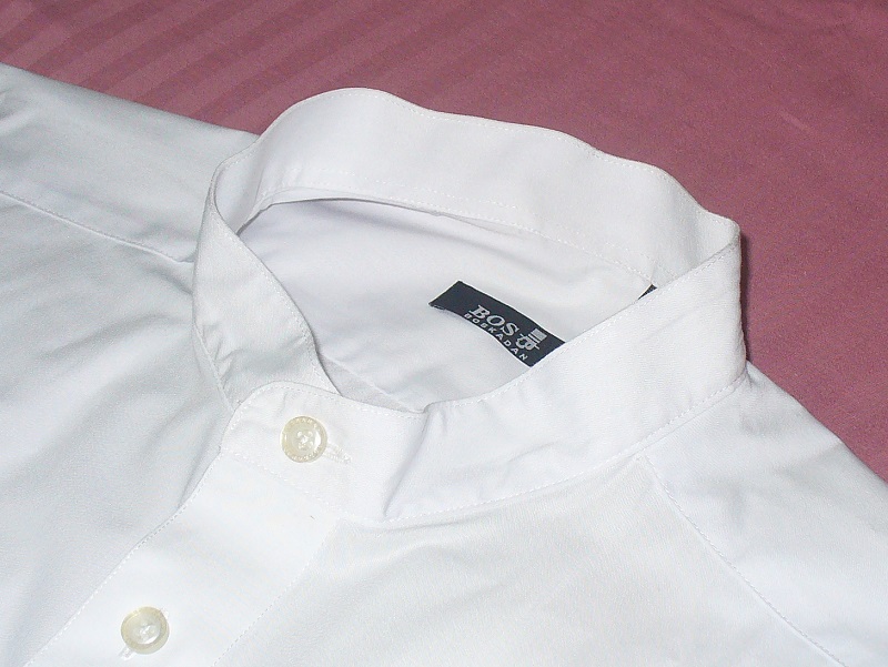 What kind of shirt goes with a round collared suit?  A round collared shirt.