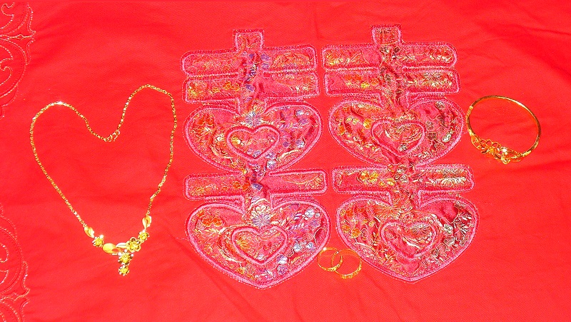 Wedding shopping in China includes a very expensive trip to the jewelry store.