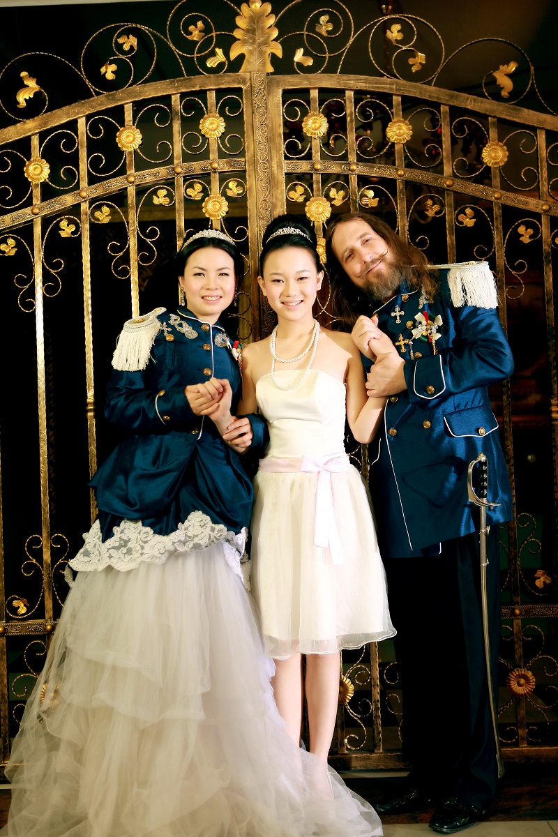 My fiancee was standing on a box in these scene at our wedding photo shoot.