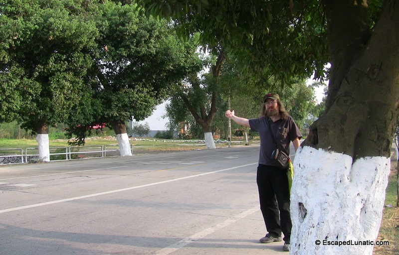 Trying to hitch hike from Shangri-La near Yangshuo.