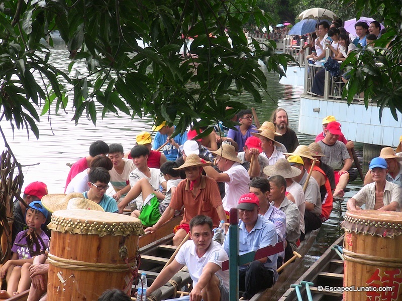 Sitting in back during the Dragon Boat Mouth Stuffing ceremony