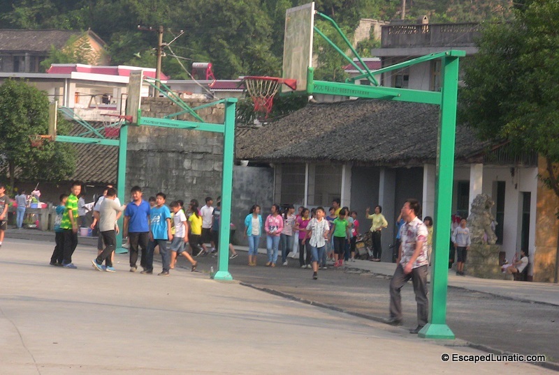 Basketball courts inside the dusty track oval