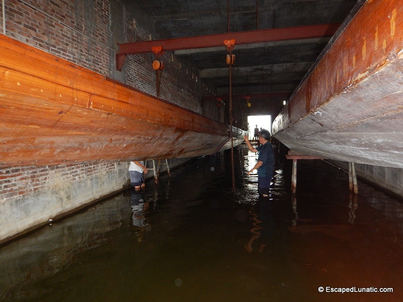 Lowering a large dragon boat