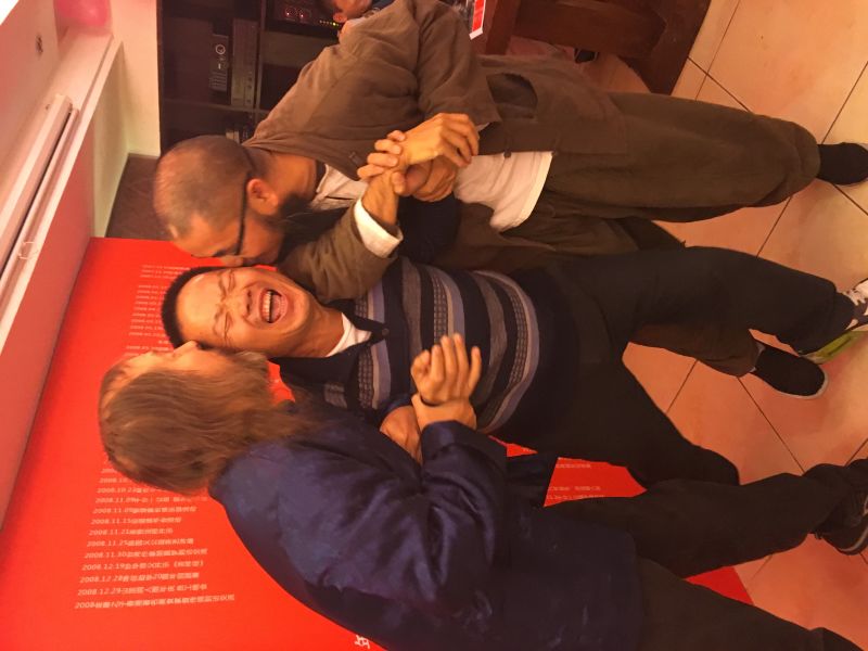 We're not kissing him. We're sucking out his brain! :-)