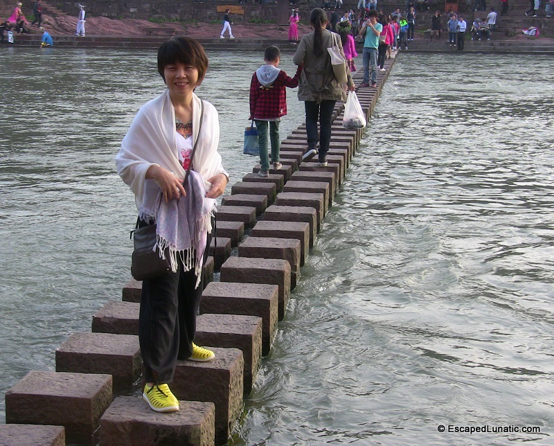 My lovely wife on the hopping bridge in FengHuang